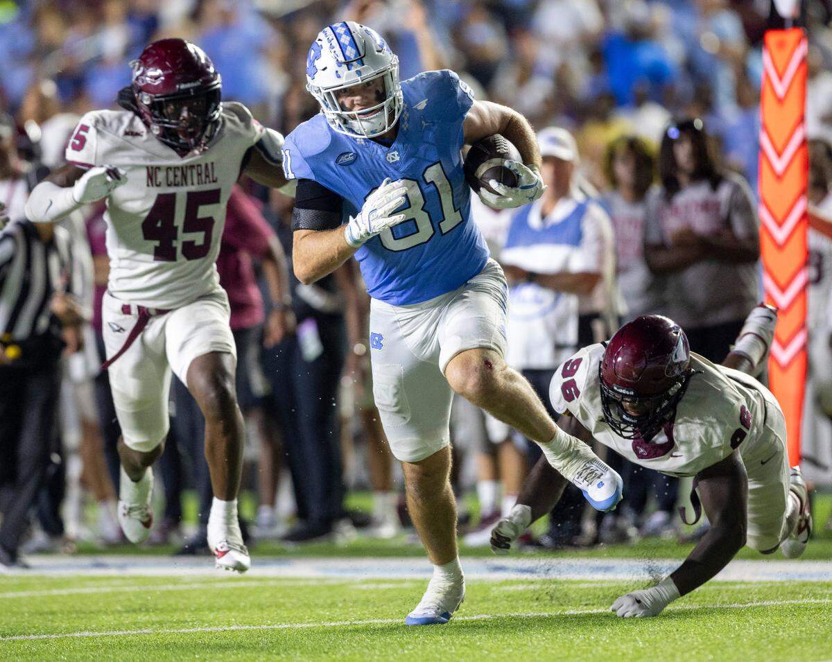 North Carolina tight end John Copenhaver (81) scores a touchdown on a 23-yard pass reception from quarterback Jacolby Criswell in the fourth quarter against N.C. Central on Saturday, September 14, 2024 at Kenan Stadium in Chapel Hill, N.C.