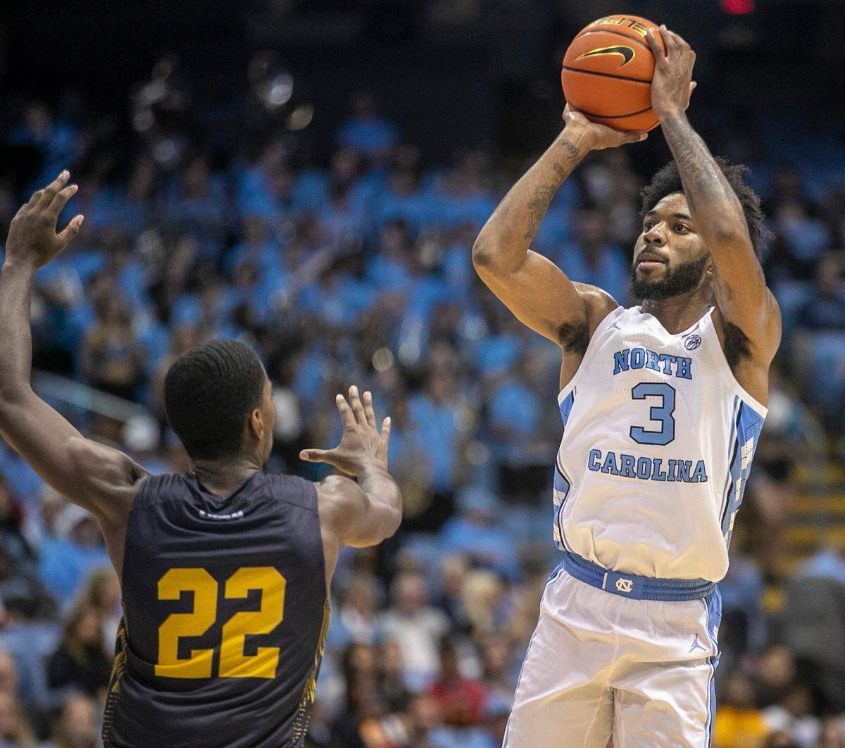 North Carolina’s Dontrez Styles (3) drives to the basket against Johnson C. Smith’s Javon Floyd (22) in the second half during an exhibition game on Friday, October 28, 2022 at the Smith Center in Chapel Hill, N.C.
