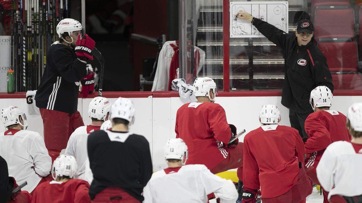 Carolina Hurricanes’ coach Rod Brind’Amour diagrams plays during practice on Tuesday, April 9, 2019 at PNC Arena in Raleigh, N.C.