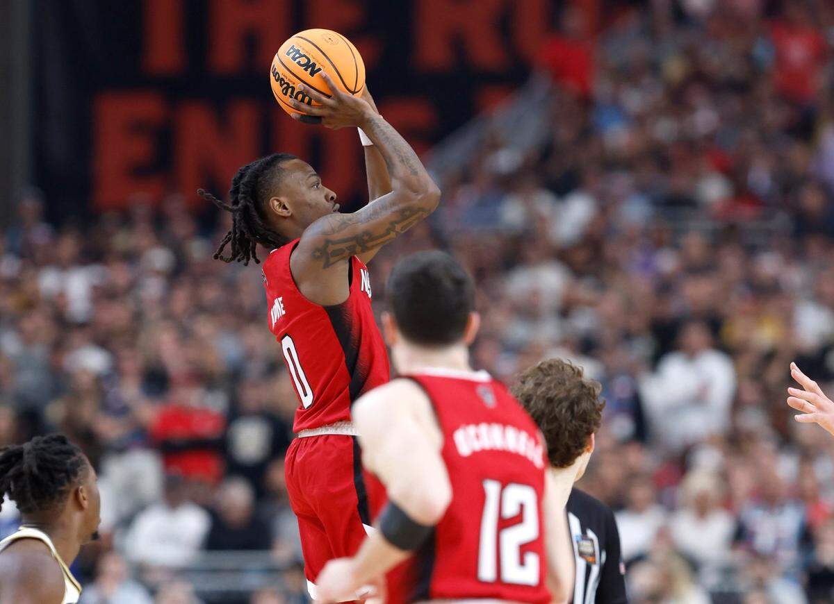 N.C. State’s DJ Horne (0) shoots during the first half of N.C. State’s game against Purdue in the NCAA Tournament national semfinals at State Farm Stadium in Glendale, Ariz., Saturday, April 6, 2024.