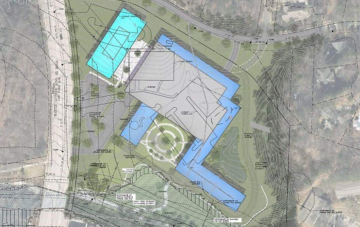 Belmont Sayre officials superimposed their concept plan for redeveloping 828 MLK Jr. Blvd. on top of a site plan showing where the Chapel Hill Police Department and its parking lots now sit. The redevelopment largely would cover the same footprint.