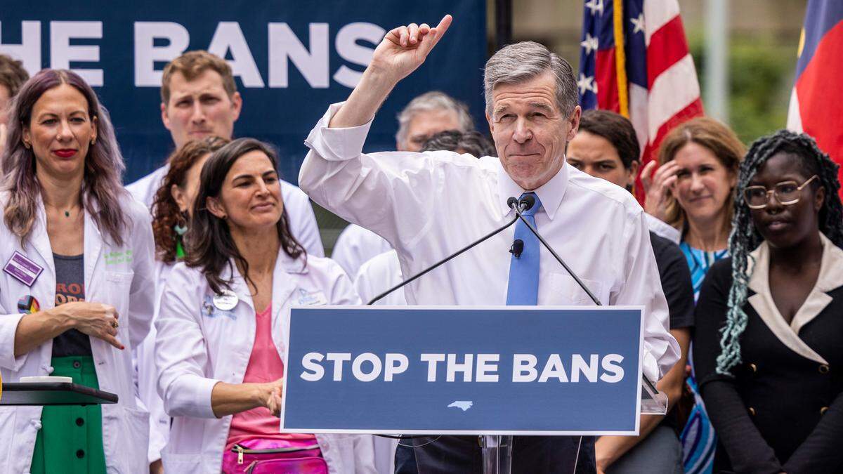 Gov. Roy Cooper prepares to veto the abortion ban bill before hundreds of supporters on Bicentennial Mall Saturday, May 13, 2023.
