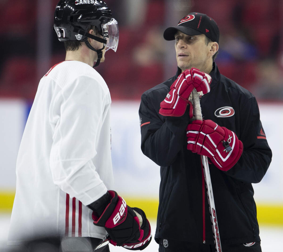 Carolina Hurricanes’ coach Rod Brind’Amour talks Andrei Svechnikov (37) during practice on Tuesday, April 30, 2019 at the PNC Arena in Raleigh, N.C.