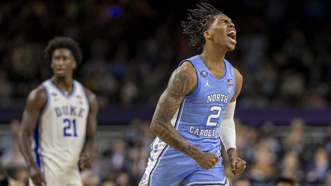 North Carolinas Caleb Love (2) reacts after sinking a basket to cut the Duke lead to two points late in the first half during the NCAA Final Four semi-final on Saturday, April 2, 2022 at Caesars Superdome in New Orleans, La.