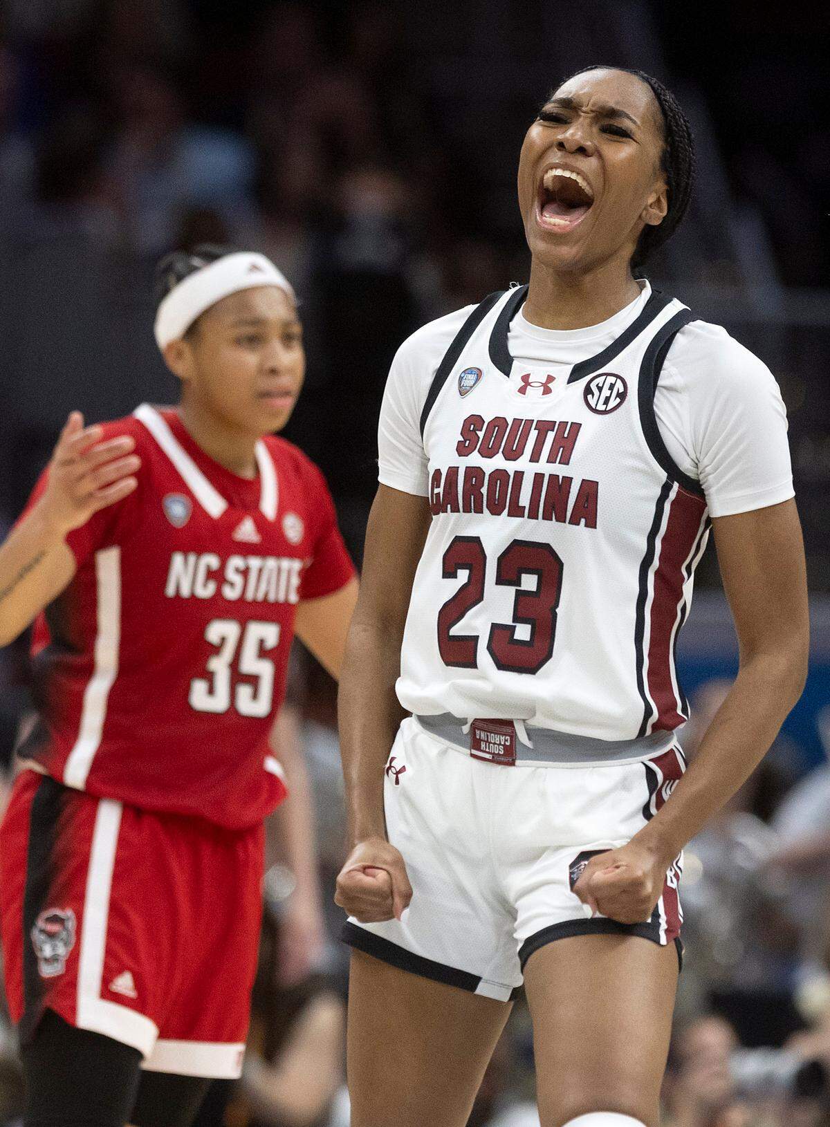 N.C. State’s Zoe Brooks looks on as South Carolina’s Bree Hall celebrates in the second half of the Wolfpack’s 78-59 Final Four loss at Rocket Mortgage FieldHouse on Friday, April 5, 2024, in Cleveland, Ohio.