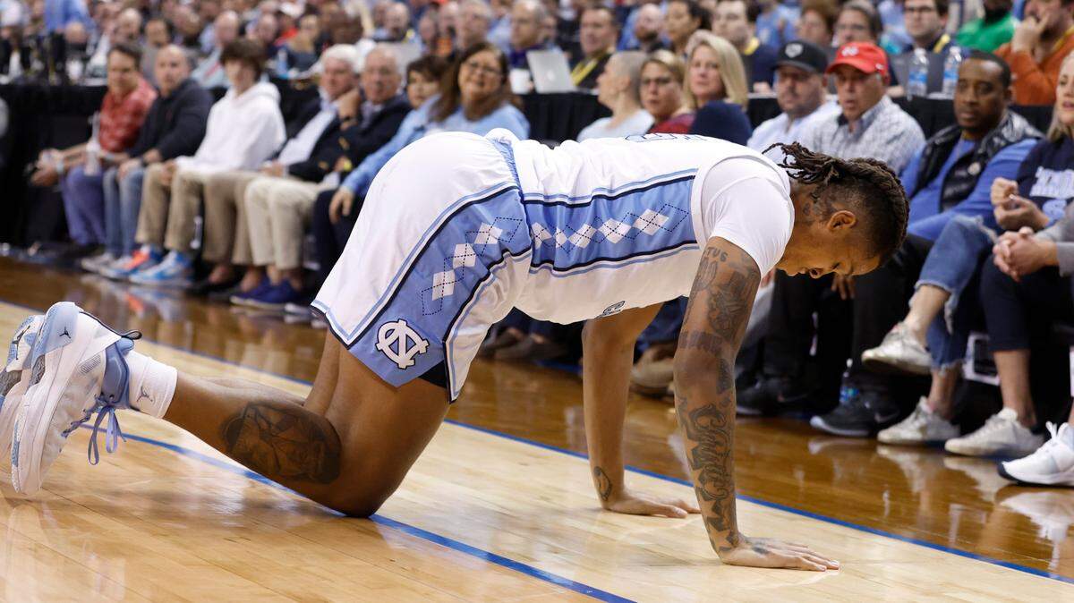 North Carolina’s Armando Bacot (5) gets himself up after he was injured during the first half of UNC’s game against Boston College in the second round of the New York Life ACC Men’s Basketball Tournament in Greensboro, N.C., Wednesday, March 8, 2023.