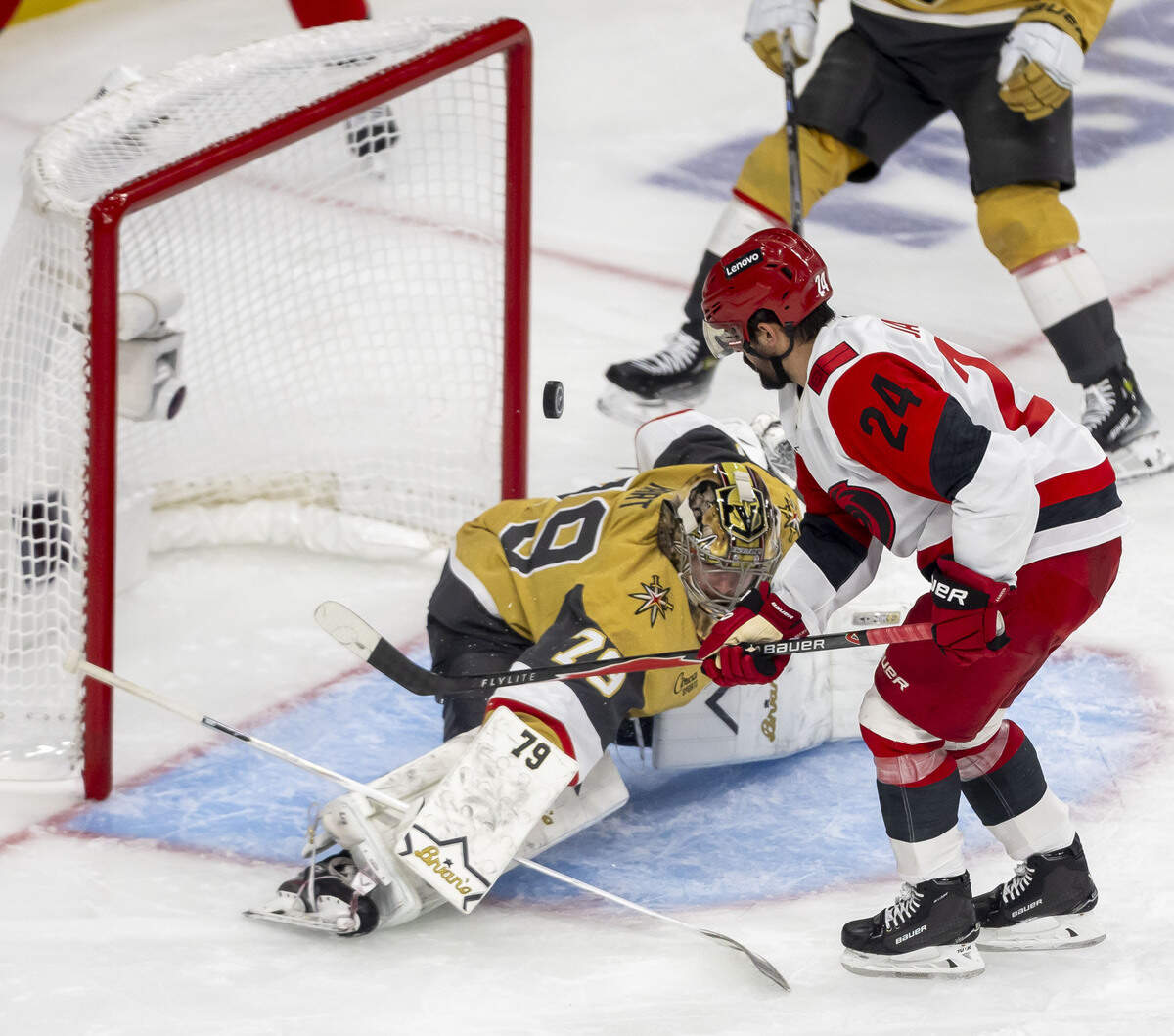Vegas goalie Carter Hart (79) deflects a scoring attempt by Carolina Hurricanes right wing Seth Jarvis (24) in the third period of Game 4 of the Stanley Cup Final, on Tuesday, June 9, 2026 in Las Vegas, NV.