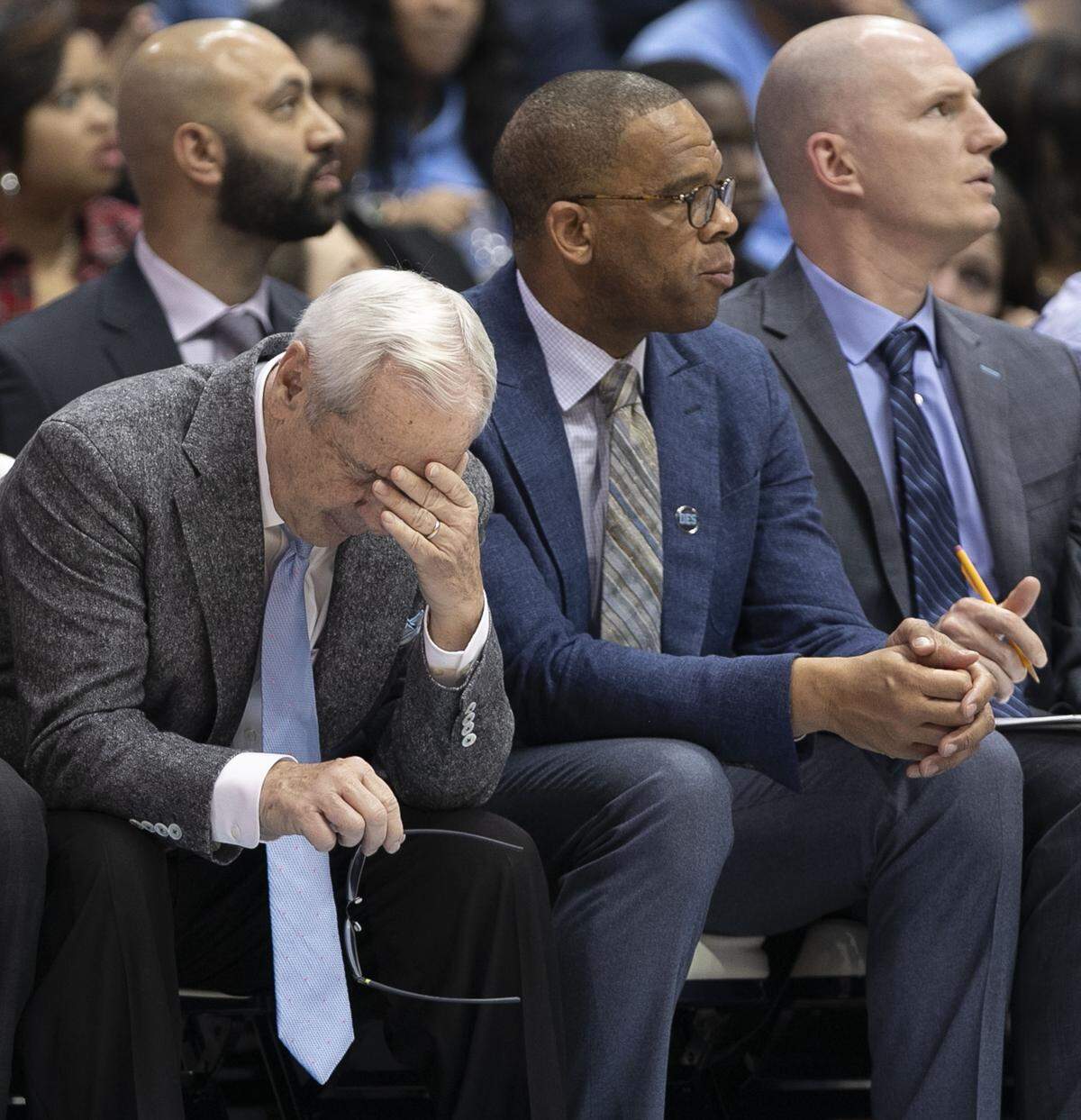 Down by 20 points in the second half to Louisville, North Carolina coach Roy Williams takes a seat on the bench on Saturday, January 12, 2019 at the Smith Center in Chapel Hill, N.C.