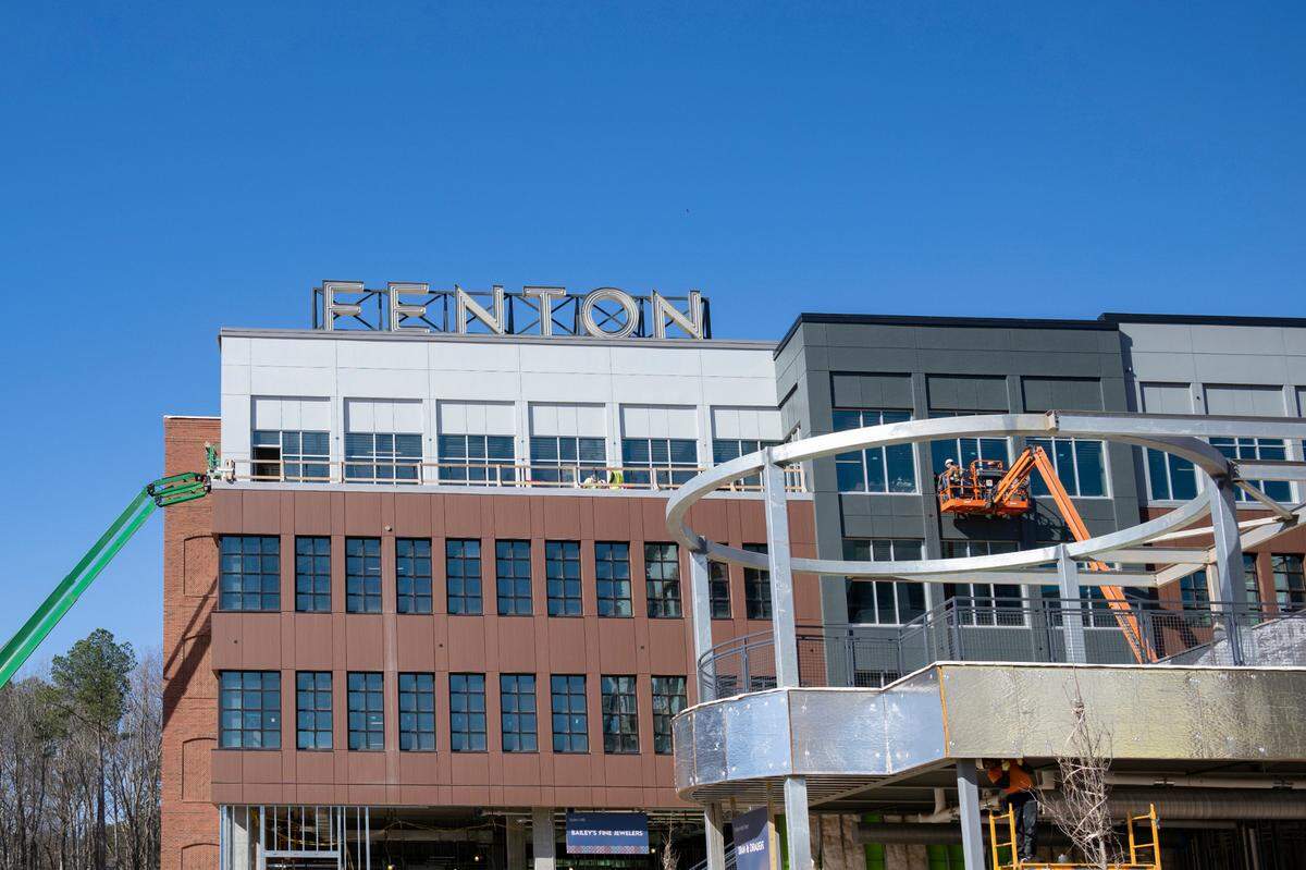 Cary’s Fenton shopping center will open its first block of retail offerings next month after years in development.