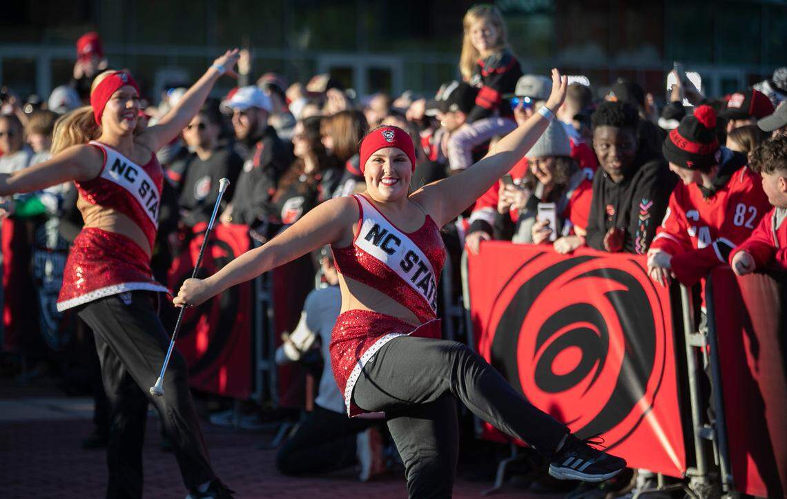 The N.C. State Marching Band performs on the plaza outside Carter-Finley Stadium as fans await the arrival of the Carolina Hurricanes for their Stadium Series game against the Washington Capitals on Saturday, February 18, 2022 at Carter-Finley Stadium in Raleigh, N.C.