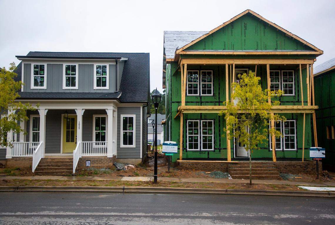 Houses in various states of completion are seen side by side in 751 South, a development in Durham, N.C., on Friday, Sept. 25, 2020.
