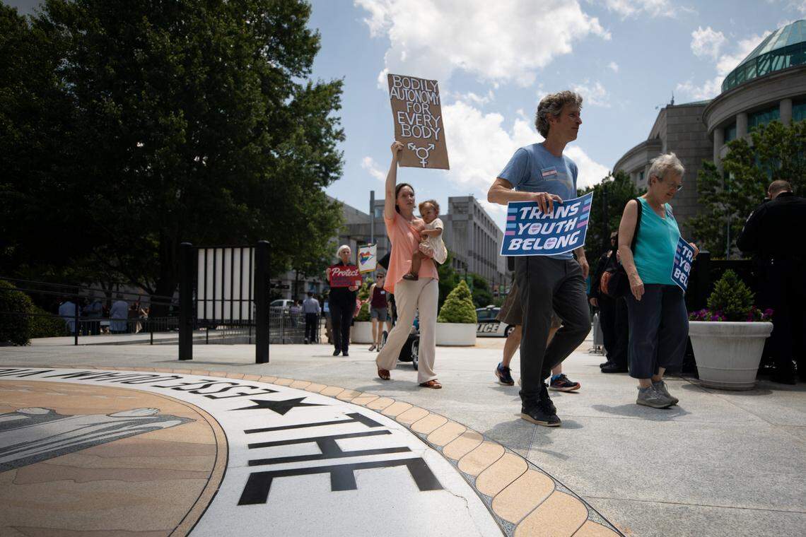 Advocates for LGBTQ+ equality march around the North Carolina General Assembly on Tuesday, June 27, 2023 to rally in opposition to anti-LGBTQ+ bills moving through the General Assembly. The legislative package includes HB808, a bill which would prohibit access to gender-affirming care for transgender youth in North Carolina as of August 1.