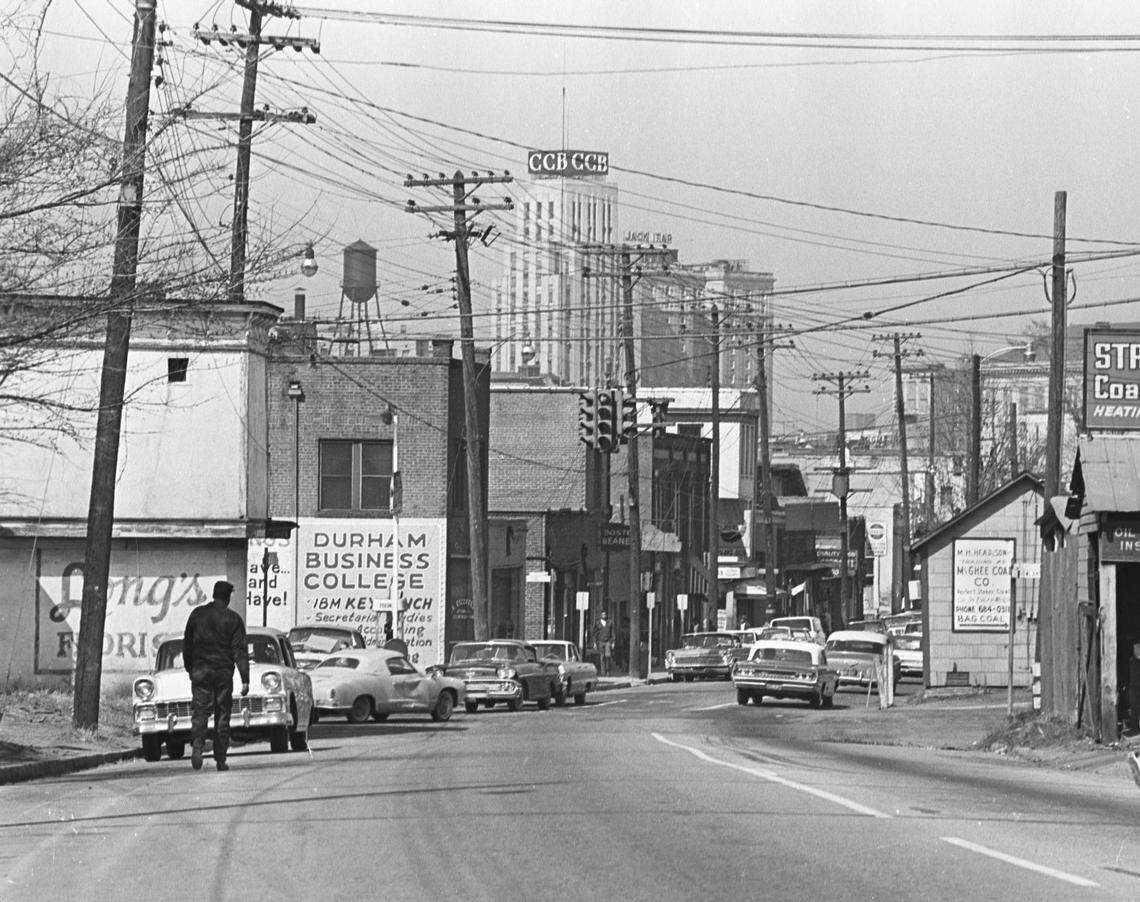 Pettigrew Street, west of Dillard Street, part of the Hayti business district before urban renewal tore everything down.