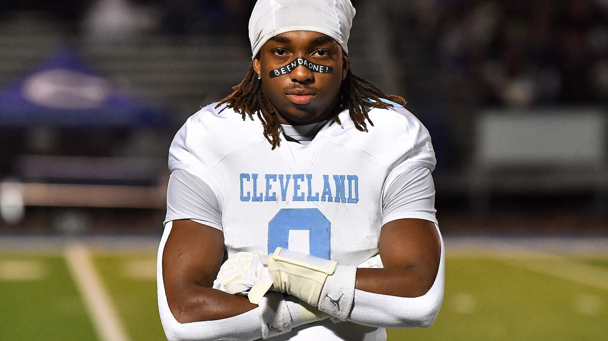 Cleveland running back Kaleb Ferrell (0) poses before the start of the game against Clayton. The Cleveland Rams took on the Clayton Comets in a conference football game in Clayton, N.C. on October 31st in Clayton, N.C.