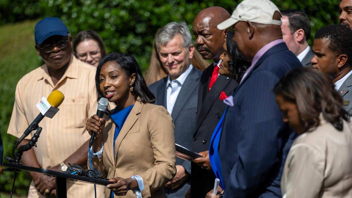 State Auditor Jessica Holmes speaks during a press conference hosted by North Carolina Black political action committees outside the North Carolina General Assembly on Wednesday, Sept. 4, 2024. Political action committees including Simkins PAC, Durham Committee and Raleigh Wake Citizens endorsed a slate of statewide candidates made up entirely of Democrats.