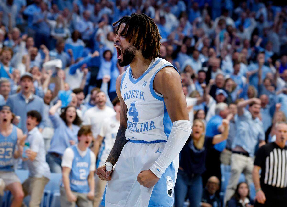 North Carolina’s RJ Davis (4) celebrates in the first half of Duke’s game against UNC at the Smith Center in Chapel Hill, N.C., Saturday, March 8, 2025.