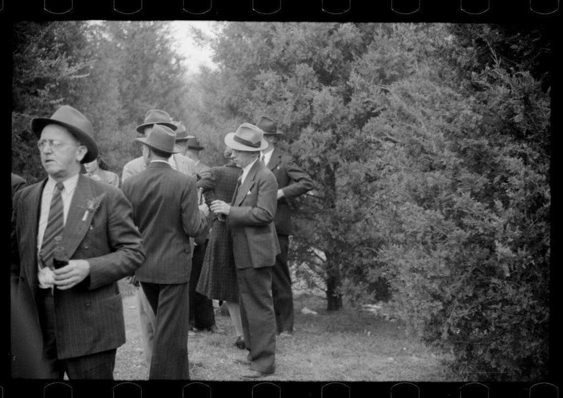 Fans drinking at halftime of the Duke-Carolina game in Durham, NC in 1939.