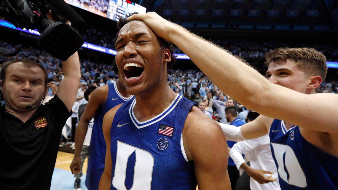 Duke’s Wendell Moore celebrates after his buzzer-beater in Duke’s 98-96 overtime victory over UNC Saturday. Moore, a freshman, missed six games earlier this season with a broken hand.
