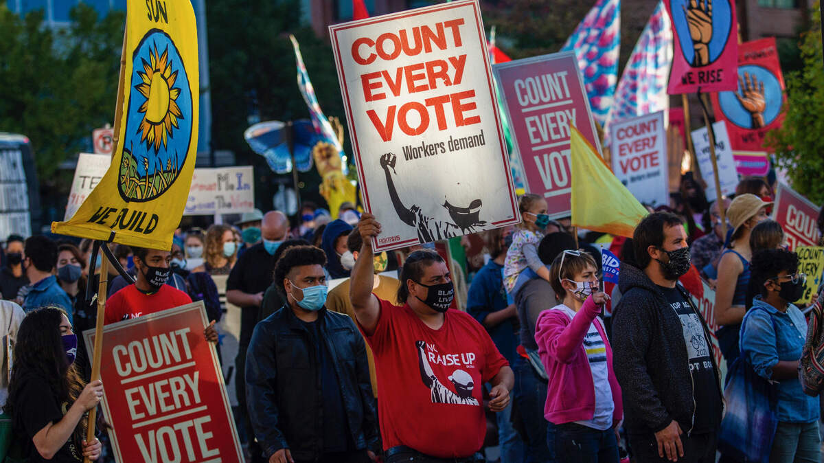 Demonstrators from several community and advocacy groups march in downtown Durham demanding that all votes cast in the recent election be counted on Wednesday, Nov. 4, 2020.