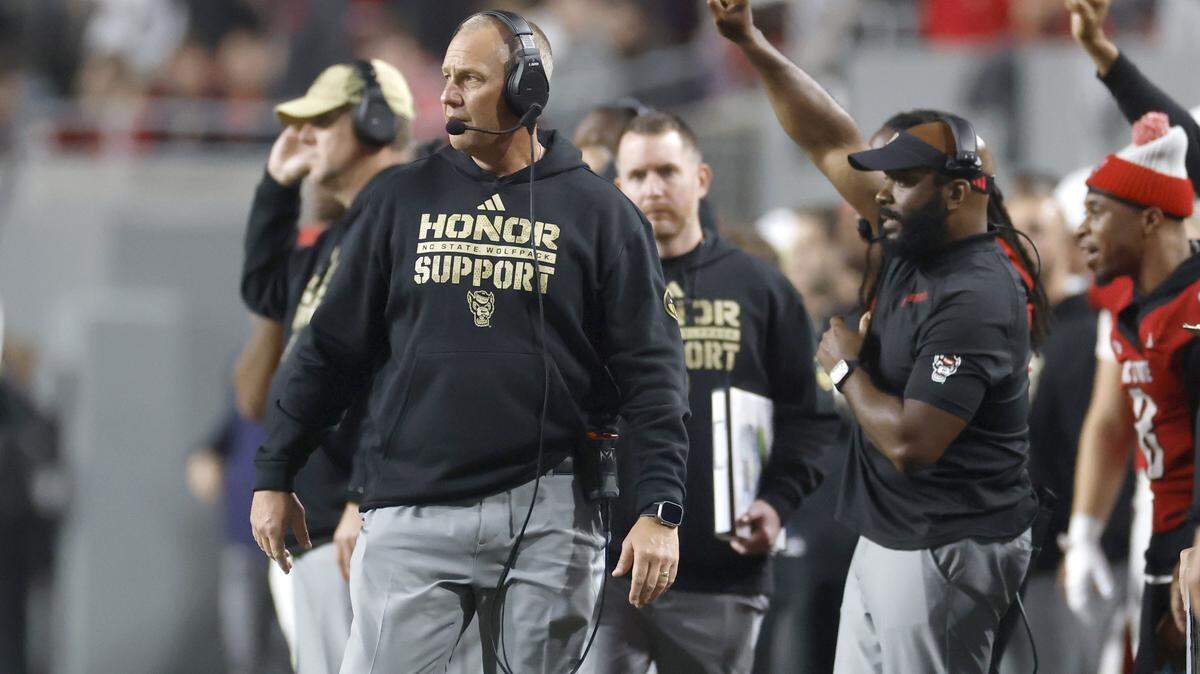 N.C. State head coach Dave Doeren watches the team during the first half of N.C. State’s game against Florida State at Carter-Finley Stadium in Raleigh, N.C., Friday, Nov. 21, 2025.