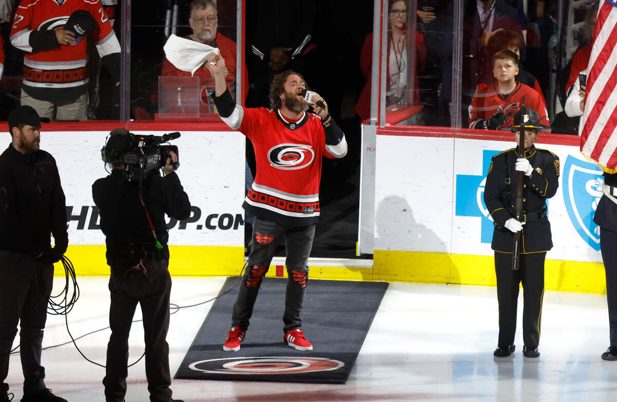 Adam Lee Decker finishes singing the National Anthem before game two between the Carolina Hurricanes and Florida Panthers in the Eastern Conference Finals at PNC Arena in Raleigh on Saturday, May 20, 2023.