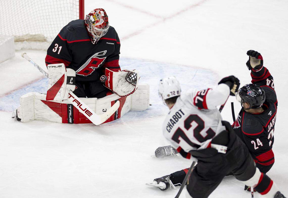 Carolina Hurricanes goalie Frederik Andersen (31) stops a scoring attempt by Ottawa defenseman Thomas Cabot (72) in the second period of Game 2 on Monday, April 20, 2026 during the first round of the Stanley Cup Playoffs at Lenovo Center in Raleigh, N.C. 