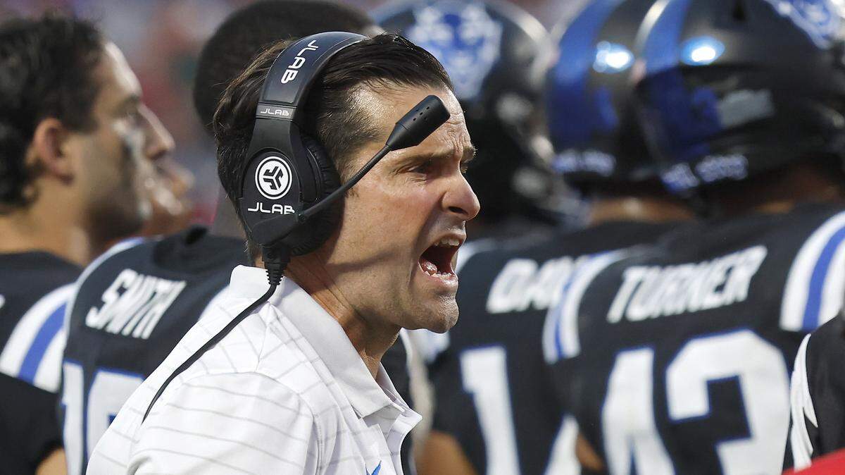 Duke head coach Manny Diaz speaks with an official during the second half of the Blue Devils’ 45-33 win over N.C. State on Saturday, Sept. 20, 2025, at Wallace Wade Stadium in Durham, N.C.