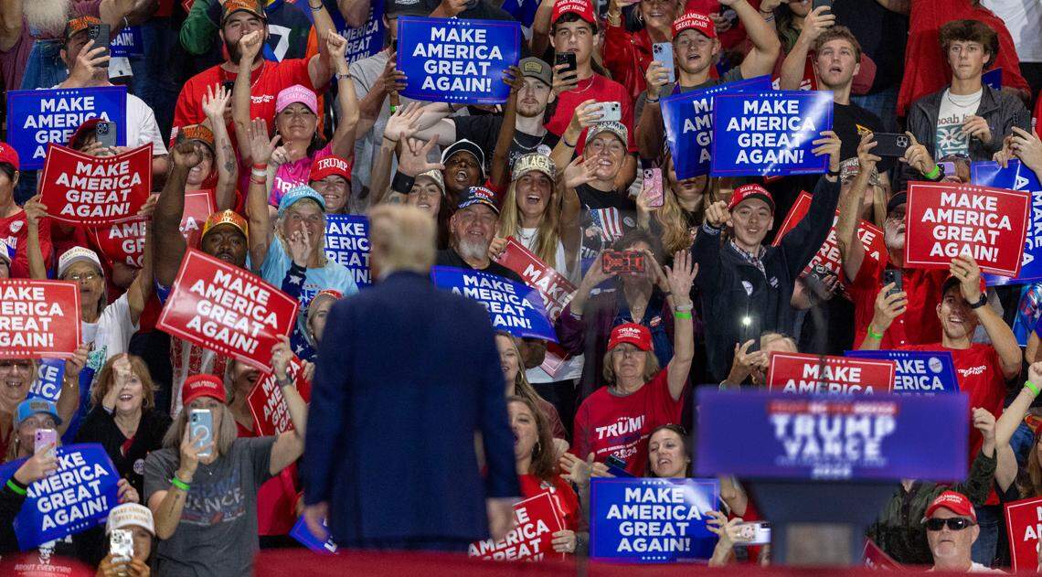Republican presidential nominee, former President Donald Trump, soaks up applause from supporters behind the dais following his remarks on Wednesday, October 30, 2024 at the Rocky Mount Event Center in Rocky Mount, N.C.