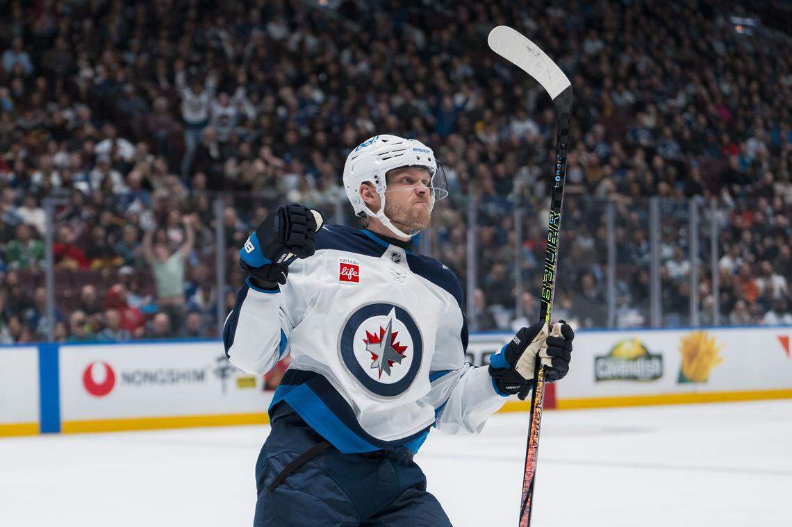 Winnipeg Jets forward Nikolaj Ehlers (27) celebrates his goal against the Vancouver Canucks in the first period at Rogers Arena. 