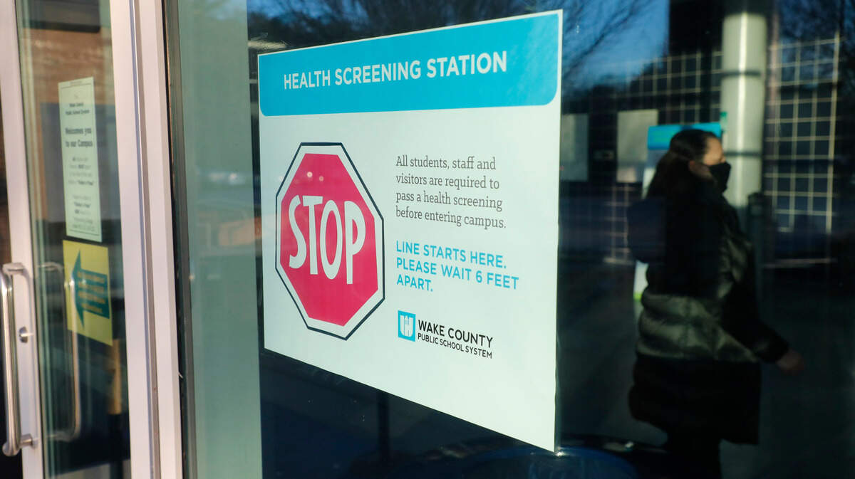 Everybody who enters Millbrook High School in Raleigh, N.C., must pass the health screening. Photographed Wednesday, February 17, 2021.