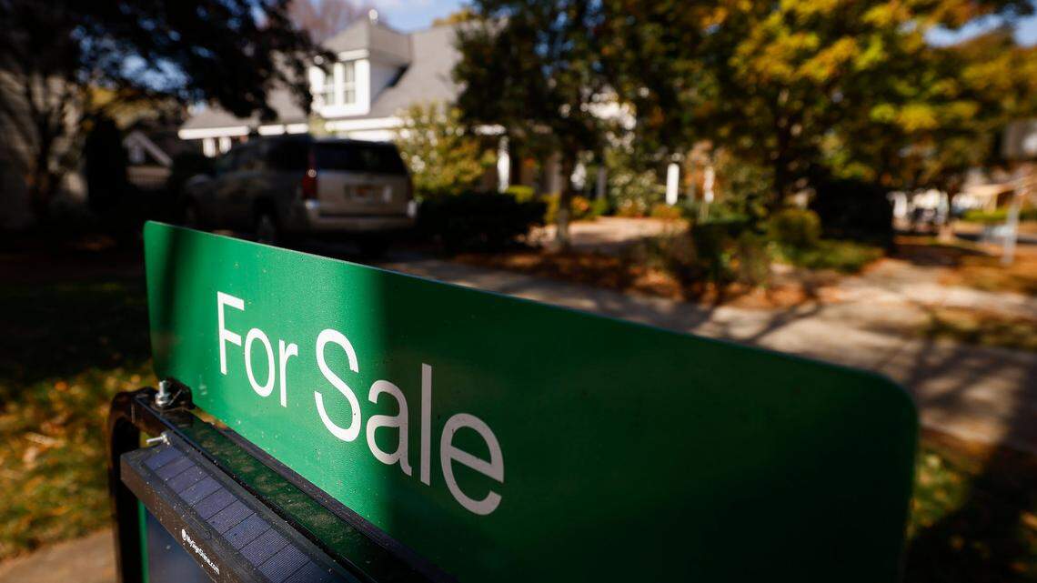 A for rent sign sits in front of a house on Circle Avenue in Charlotte, N.C., Friday, Nov. 4, 2022. 