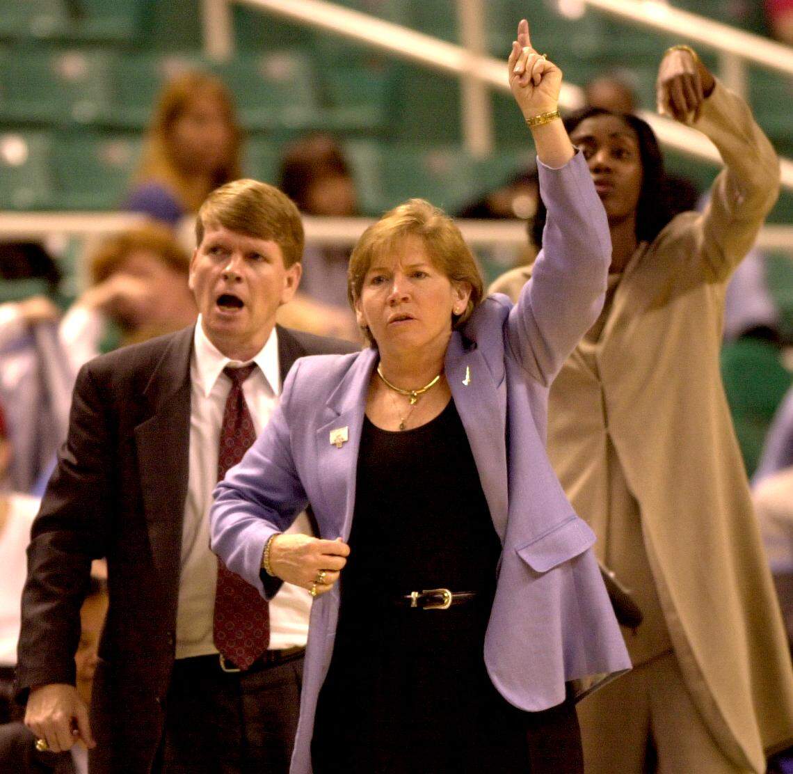 UNC coach Sylvia Hatchell, center, flanked by her assistants Andrew Calder, and Sylvia Crawley direct the Tar Heels to victory over N.C. State Sunday in the semi finals of the ACC Tournament in the Greensboro Coliseum in 2002.