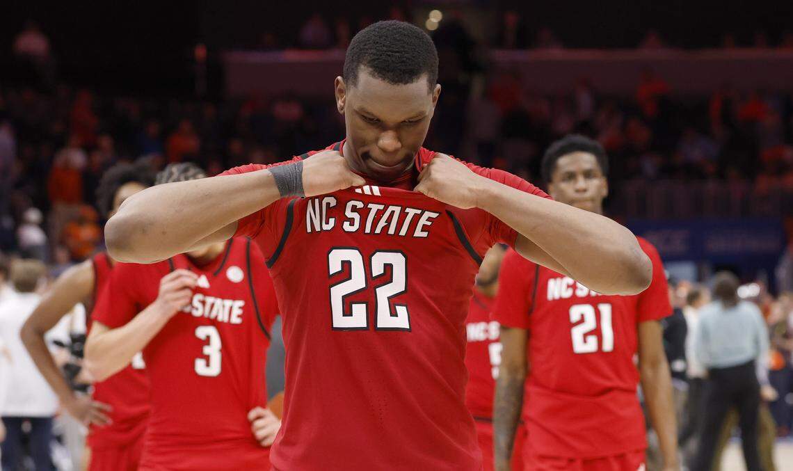 N.C. State's Ven-Allen Lubin (22) and the team walk off the court after Virginia’s 81-74 victory over N.C. State in the quarterfinals of the 2026 ACC Men’s Basketball Tournament at the Spectrum Center in Charlotte, N.C., Thursday, March 12, 2026.
