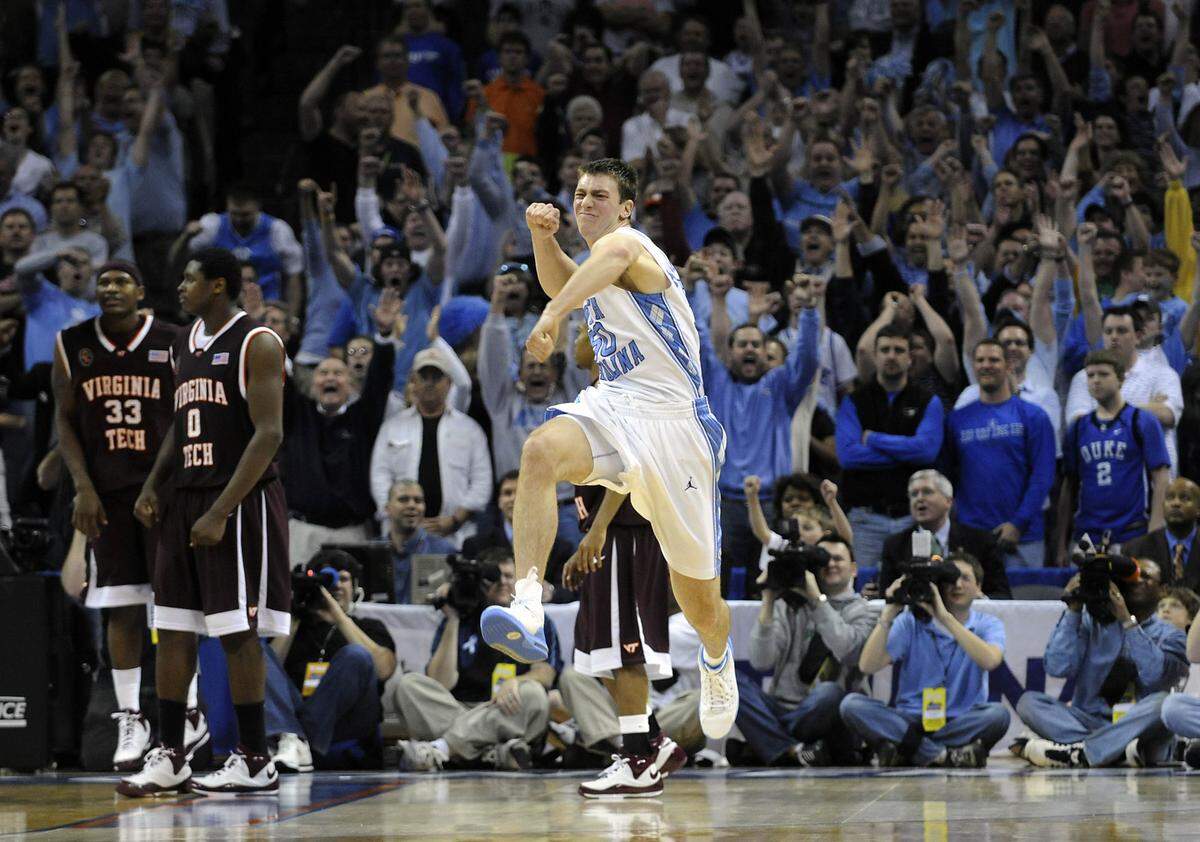 North Carolina's Tyler Hansbrough celebrates his game winning shot with under a second left against Virginia Tech in the semifinals of the 55th annual ACC tournament at Bobcats Arena. North Carolina won, 68-66 to advance to the championship game. 