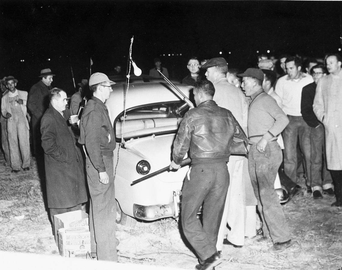 Armed Lumbee and other Robeson County Native Americans confront a group of white men as the Lumbee ousted the KKK from Maxton, N.C. at the “Battle of Hayes Pond”, Jan. 18, 1958.