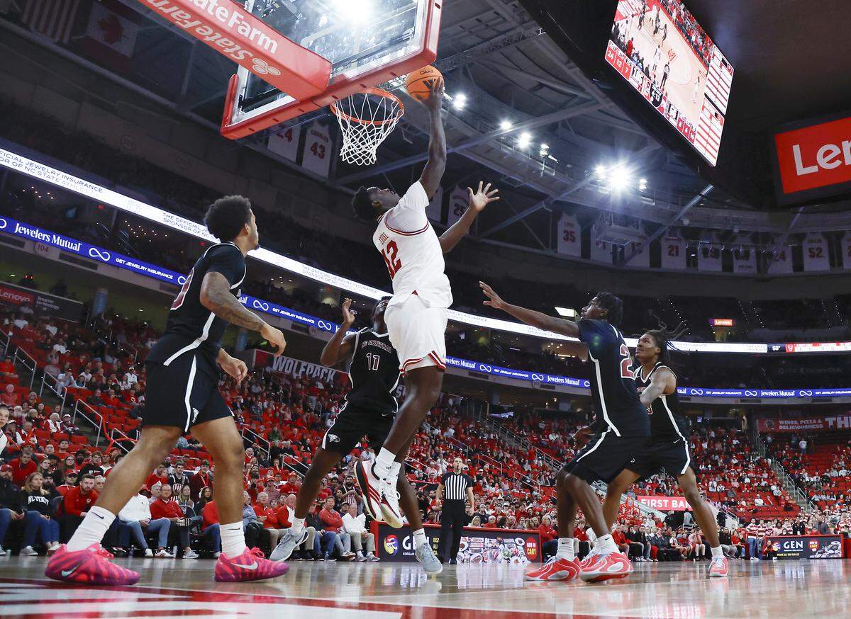 N.C. State’s Scottie Ebube lays the ball in during the second half of the Wolfpack’s 114-66 win over North Carolina Central on Monday, Nov. 3, 2025, at Lenovo Center in Raleigh, N.C.