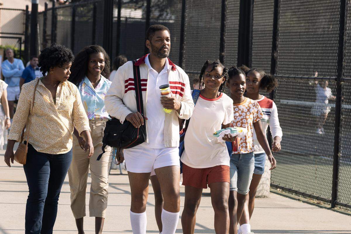 Will Smith stars as Richard Williams in “King Richard,” the father of tennis superstars Venus and Serena Williams. The film is set in the late 1980s and 1990s.
