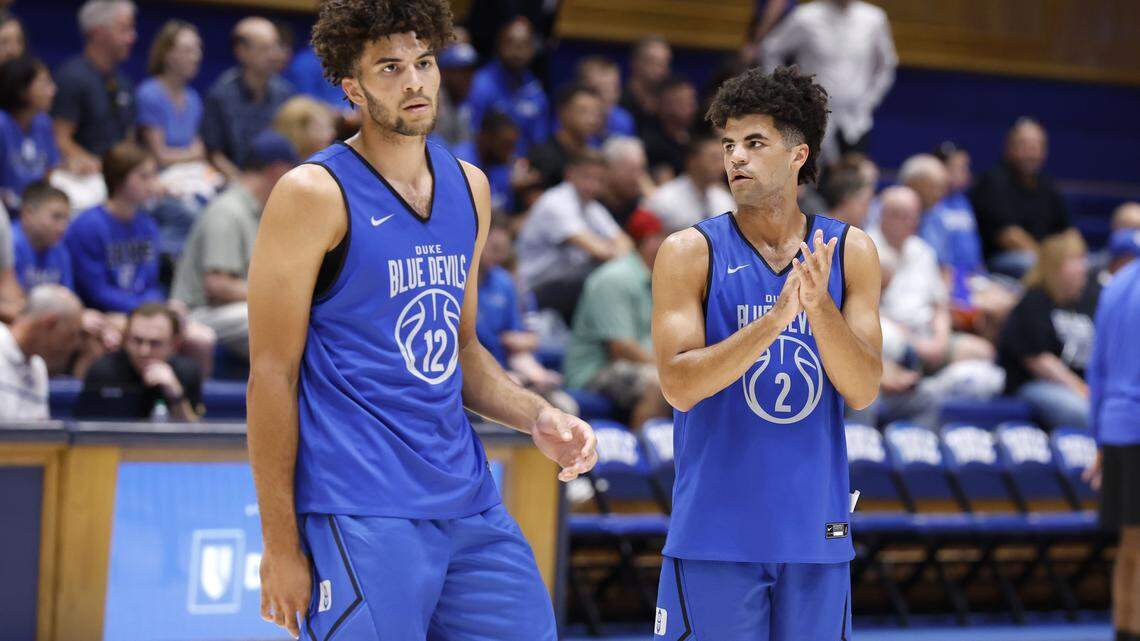 Duke’s Cameron Boozer (12) and his twin brother Cayden Boozer (2) practice at Cameron Indoor Stadium in Durham, N.C., Wednesday, Sept. 24, 2025. Duke’s Cameron Boozer (12) and his twin brother Cayden Boozer (2) practice at Cameron Indoor Stadium in Durham, N.C., Wednesday, Sept. 24, 2025.