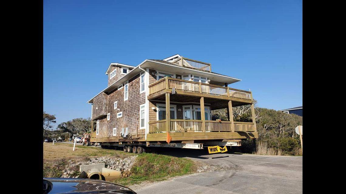 Why was this house being moved? To build a bigger house!