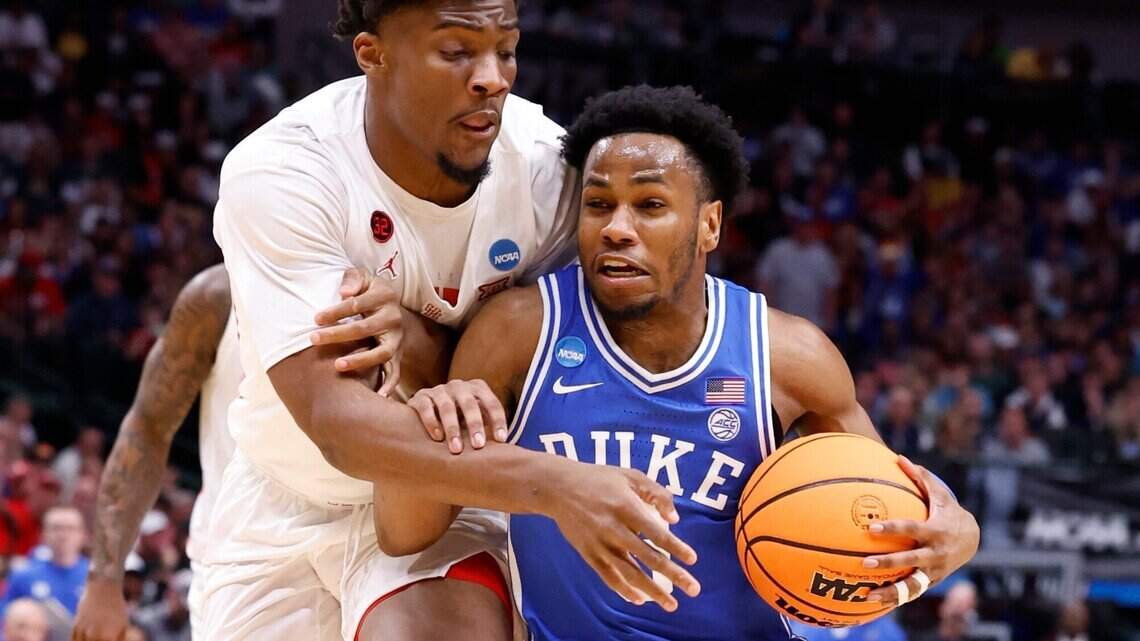 Duke holds off Houston. Blue Devils down top seed to reach NCAA Tournament Elite Eight