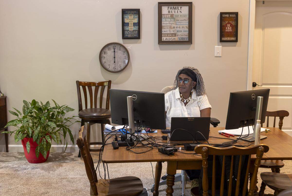 Retired state employee Margaret Reader, still works part-time for the state, from her home in Clayton, N.C. on Thursday, September 18, 2025.  Reader sees first hand how delays in passing a state budget affects the state employee she serves.