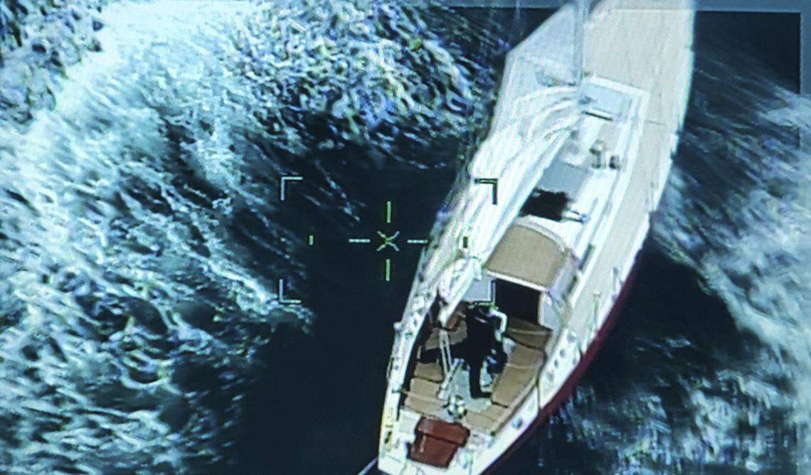 Two sailors were rescued Saturday after rough seas disabled the sails and engine on the sailboat, according to the U.S. Coast Guard.