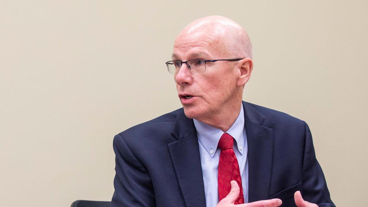 UNC-Chapel Hill Provost Bob Blouin talks with members of the Faculty Executive Committee during a meeting held to address the settlement between the UNC Board of Governors and N.C. Sons of Confederate Veterans, giving them ‘Silent Sam’ and $2.5 million dollars, on Monday, Dec. 9, 2019, in Chapel Hill, NC.