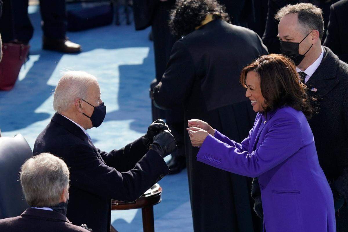 President-elect Joe Biden congratulates Vice President Kamala Harris after she was sworn in during the 59th Presidential Inauguration at the U.S. Capitol in Washington, Wednesday, Jan. 20, 2021.