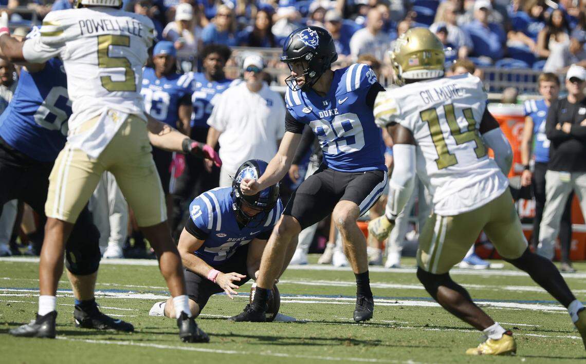 Duke kicker Todd Pelino (29) can’t make the kick for a field goal attempt as Duke’s Kade Reynoldson (41) holds the ball during the first half of Duke’s game against Georgia Tech at Wallace Wade Stadium in Durham, N.C., Saturday, Oct. 18, 2025.