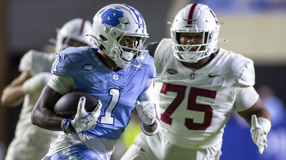 North Carolina receiver Jordan Shipp (1) heads to the end zone for a touchdown on a 55 yards pass play from quarterback Gio Lopez (7) to give the Tar Heels a 20-3 lead over Stanford in the fourth quarter on Saturday, November 8, 2025 at Kenan Stadium in Chapel Hill, N.C.