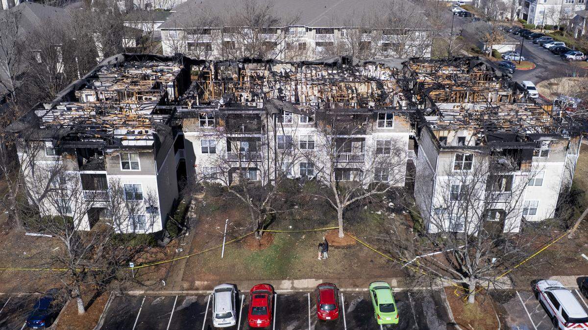 The scene at the Camden Westwood apartments at 2100 Summit Ridge Loop in Morrisville following a three-alarm fire that began Monday evening. The blaze ignited around 6 p.m. at one of the complex’s residential buildings. The fire affected 30 apartments and displaced approximately 70 residents. One person was taken to a local hospital for treatment while five others were treated at the scene for smoke inhalation.