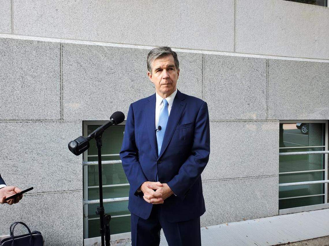North Carolina Gov. Roy Cooper talks to reporters on Tuesday, Sept. 14, 2021, outside the N.C. Department of Transportation building after a Council of State meeting in downtown Raleigh.