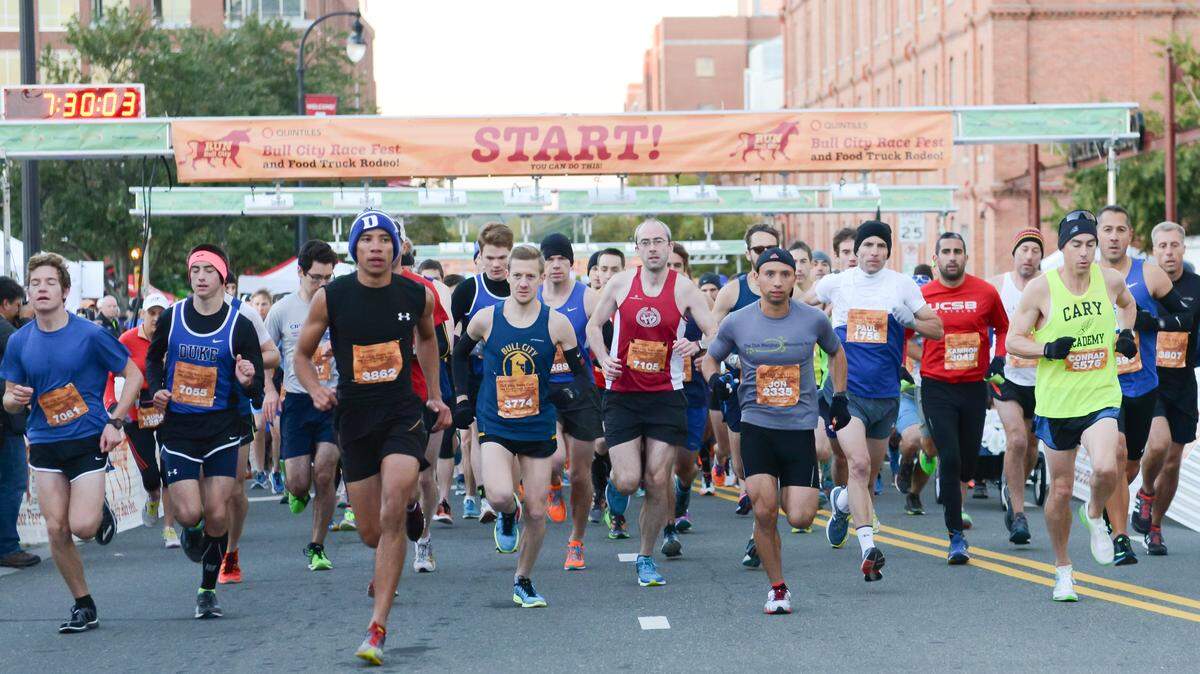 Runners start the half-marathon race. The Quintiles Bull City Race Fest & Food Truck Rodeo took place in Durham, N.C. on Sunday, October 18, 2015.
