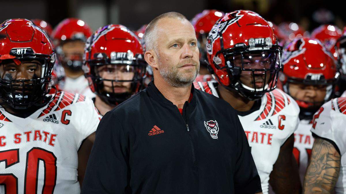 N.C. State head coach Dave Doeren prepares to lead his team onto the field before N.C. State’s game against Clemson at Memorial Stadium in Clemson, S.C., Saturday, Oct. 1, 2022.